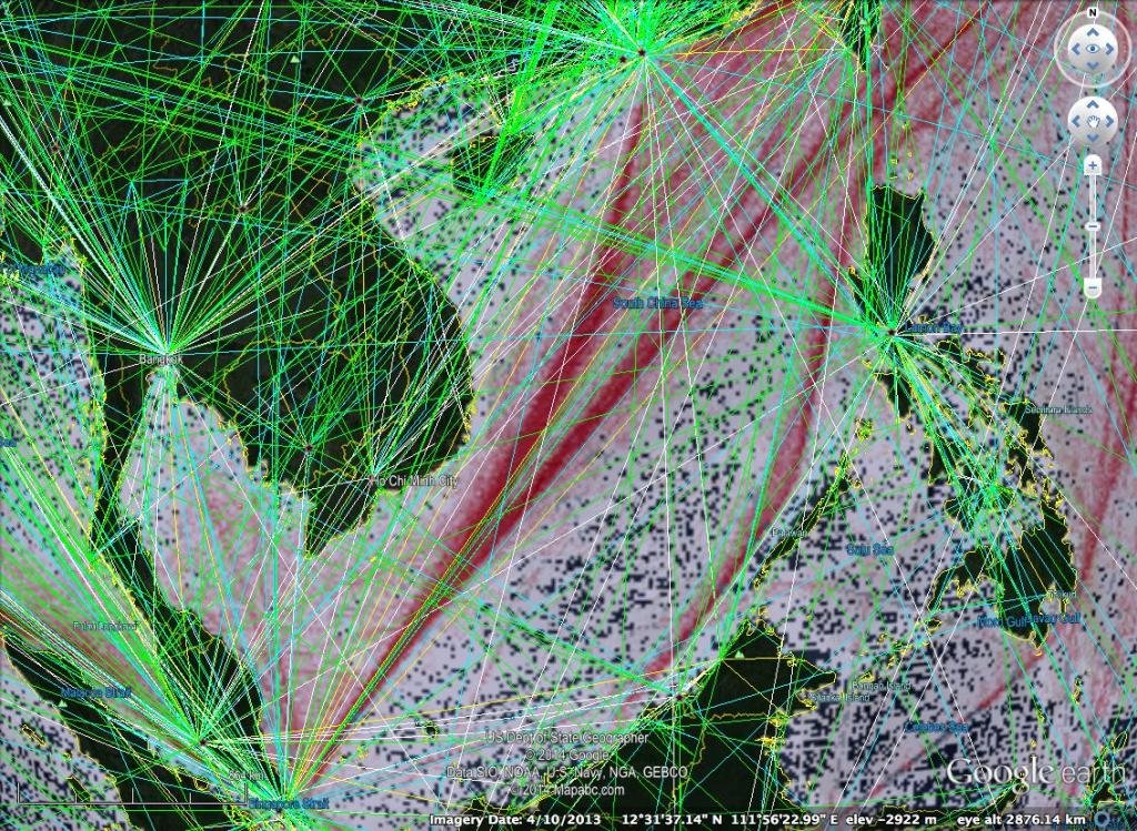 Figure . Sea routes (red) and air routes (green) through the West Philippine Sea and South China Sea. Bajo de Masinloc is strategically located between such routes near Manila and Subic. (Source: NCEAS, ICAO)